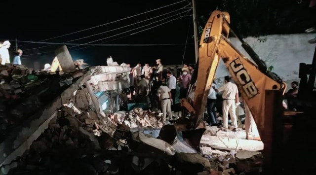 Rescue operations are on at the building collapse site. (Express Photo)