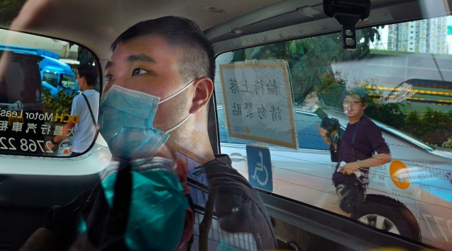 Tong Ying-kit in a police van in Hong Kong. (AP Photo/File)