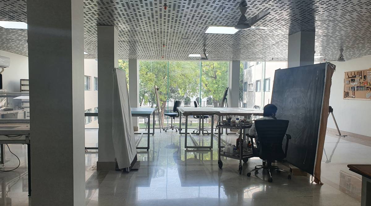 The conservation lab looks much more equipped and busy than before, moving from a dingy basement at the previous location to the ventilated and bright first floor, with a glass facade overlooking a lawn space. (Express Photo: Divya A)
