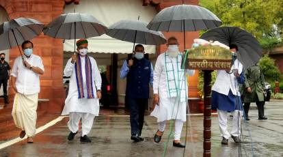 Holding umbrella by self, PM Modi addresses media in rain ahead of monsoon  session of parliament