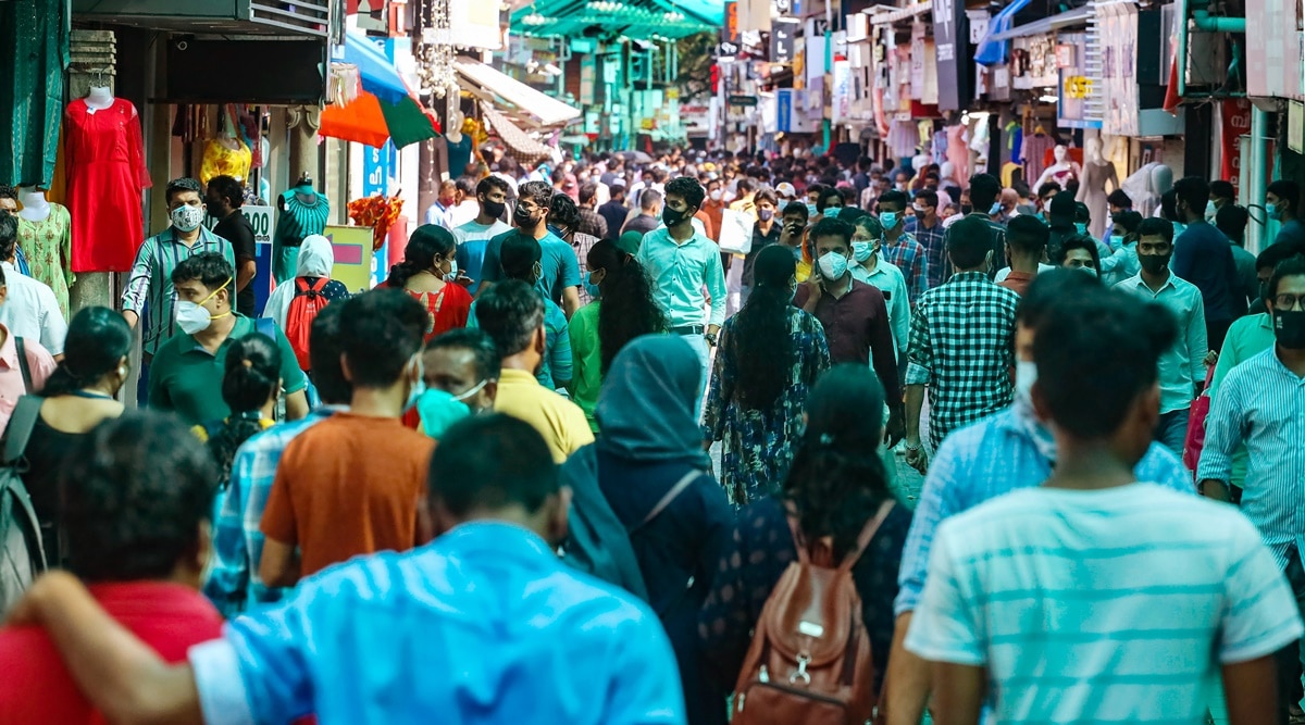 People shop at a market on the eve of Eid-ul-Adha, in Kozhikode, Monday, July 19, 2021. (PTI)