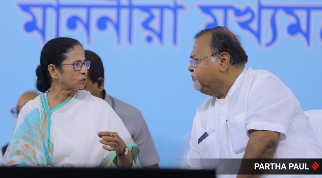 Chief Minister Mamata Banerjee with TMC leader Partha Chatterjee. (Express photo by Partha Paul/File)