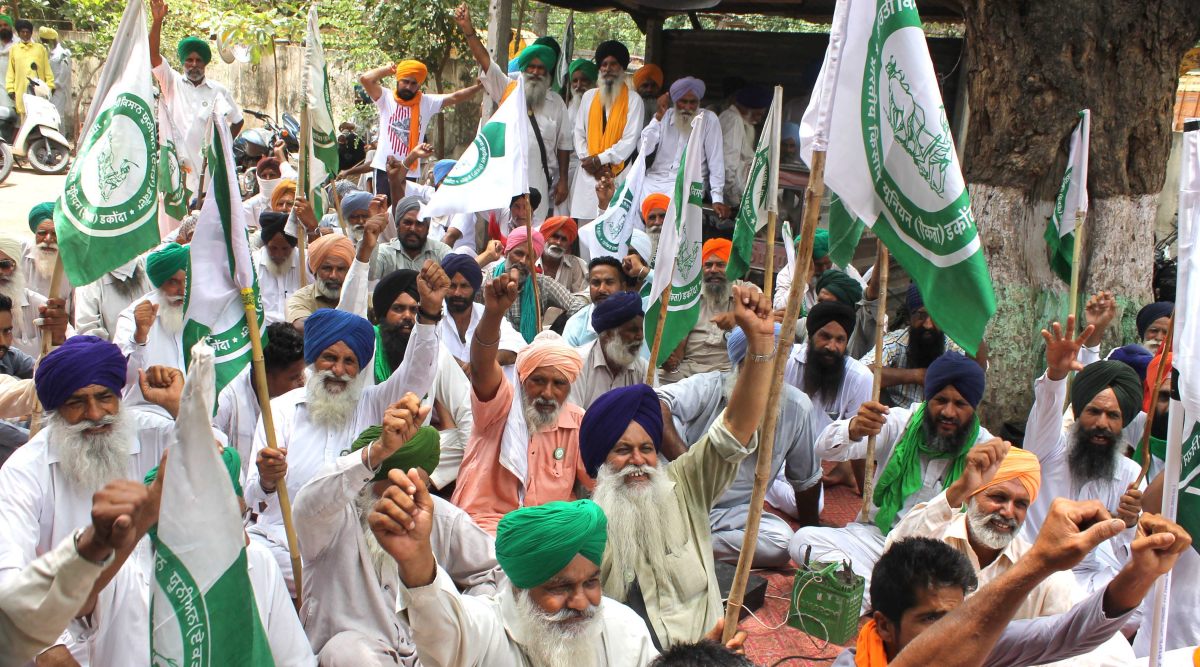 Members of Bhartiya Kisan Union, Dhakonda, protesting near 66KV Grid, old electricity office in Patiala on Friday. (Express Photo by Harmeet Sodhi)