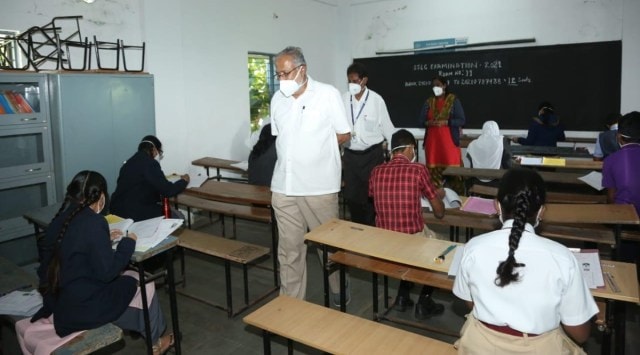 Primary and Secondary Education Minister S Suresh Kumar inspects an exam centre in Bengaluru as the exam was underway. (Express Photo)