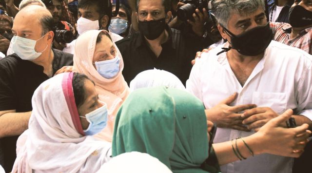 Actor Saira Banu surrounded by friends and relatives at the funeral of her husband Dilip Kumar. (Express Photo by Pradip Das)