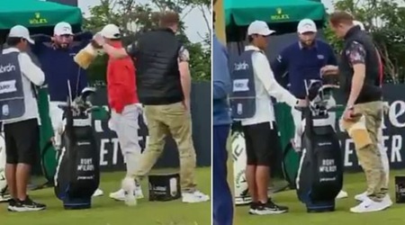 Widely spread footage on social media showed a man walk on to the tee, take the head cover off McIlroy's driver and then grab an iron from the bag. McIlroy, a four-time major winner, was seen looking on in bemusement. (Screenshot)
