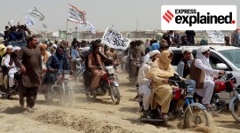 People on vehicles gather near Friendship Gate crossing on Pakistan-Afghanistan border, in Chaman no alt set