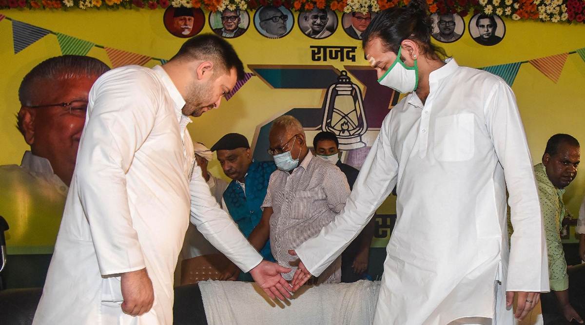 Tejashwi Yadav with brother Tej Pratap in Patna. (ANI)