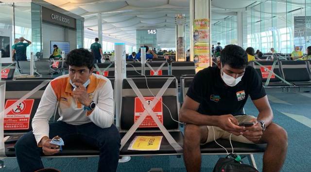 K C Ganapathy and Vishnu Saravanan at Haneda airport, Tokyo, Tuesday. (SAI Photo)