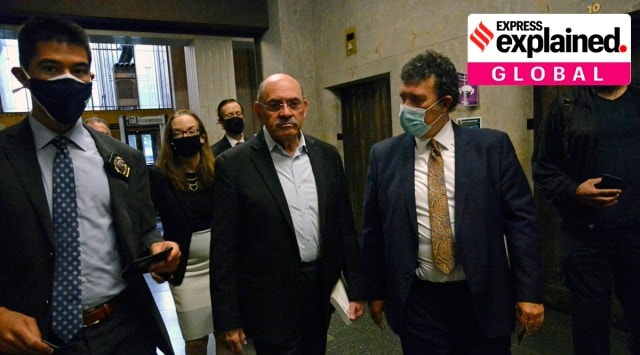 Allen Weisselberg, second from left, Donald Trump's long-serving chief financial officer, surrenders Thursday morning, July 1, 202. (Jefferson Siegel/The New York Times)
