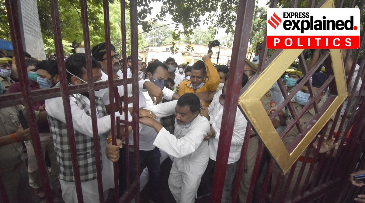 BJP and SP workers clash at the collectorate office on the last day of nomination for the District Panchayat polls, in Gorakhpur, Saturday, June 26, 2021. (PTI Photo) 