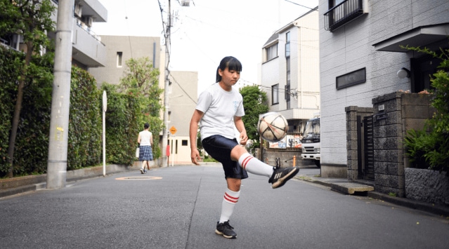 Kurumi Mochizuki, 13, practices outside her home in Tokyo. (The New York Times)
