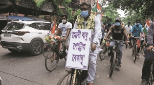 West Bengal: Minister pedals 38 km to protest fuel price hike