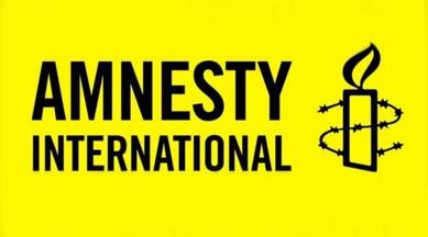pegasus, pegasus spyware, amnesty international pegasus, amnesty pegasus, amnesty india pegasus, ban amnesty, pegasus snooping, pegasus surveillance, ashwini vaishnaw, himanta sarma pegasus, pegasus news