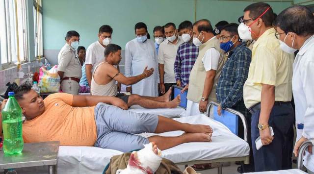 Assam CM Sarma visits policemen injured in the clash with Mizoram forces, at a hospital in Silchar Tuesday. (PTI)