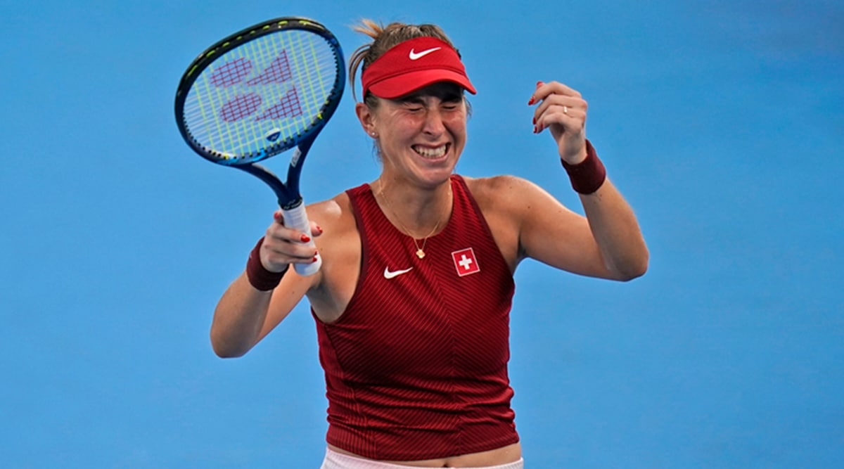 Belinda Bencic, of Switzerland, reacts after defeating Elena Rybakina, of Kazakhstan, during the semifinals of the tennis competition at the 2020 Summer Olympics, Thursday, July 29, 2021, in Tokyo, Japan. (AP)