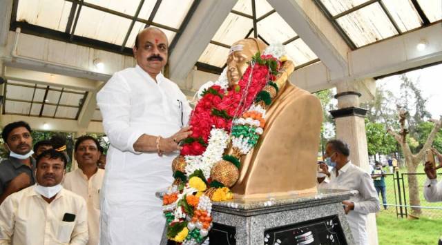 Karnataka Chief Minister Basavaraj Bommai pays tribute to his parent at a memorial.