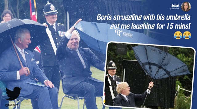 boris johnson, boris johnson umbrella video, boris johnson umbrella struggles, prince charles boris johnson umbrella video, boris johnson umbrella memes, viral news, UK News, indian express news