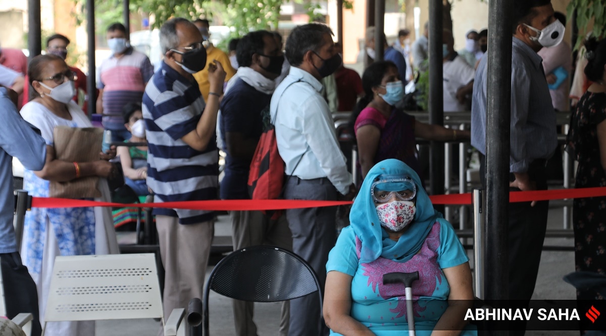 People line up for vaccination in Gurgaon's Sector 31 (Express photo by Abhinav Saha/File)