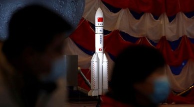 A model of the Long March-5 Y5 rocket from China's lunar exploration program Chang'e-5 Mission is displayed at an exhibition inside the National Museum in Beijing, China March 3, 2021.