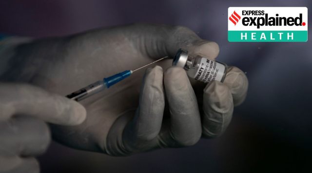 A health workers prepares to vaccinate a beneficiary with a vaccine against Covid-19. (AP Photo/File)