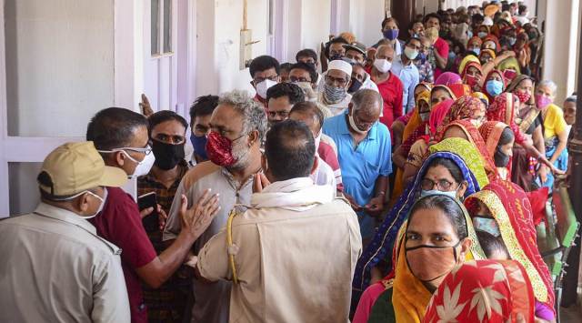 Police try to regulate the queue for Covid-19 vaccination at Bhartia Hospital in Fatehpur, Rajasthan, Tuesday. (PTI)