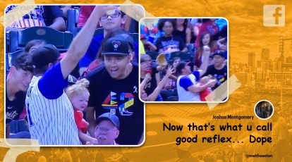 Baby stares at beer at baseball game