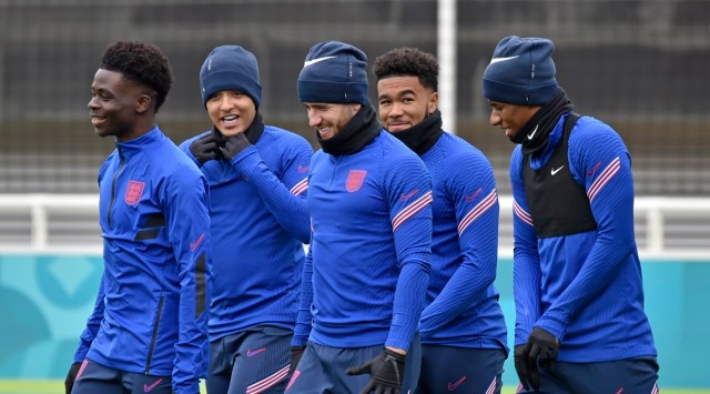 England's Bukayo Saka, Jadon Sancho, Ben Chilwell, Reece James and Marcus Rashford, from left, arrive for a training session at St George's Park, Burton upon Trent, England, Tuesday July 6, 2021, ahead of their Euro 2020 soccer championship semifinal match against Denmark in London on Wednesday. (Source: AP)