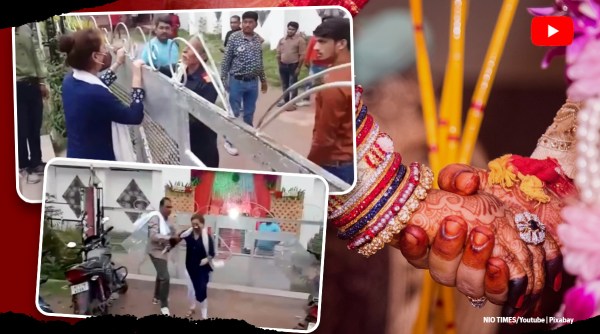 woman create ruckus outside lover wedding hall, woman babu babu video lover marriage, woman scene outside boyfriend wedding venue, viral video, indian express