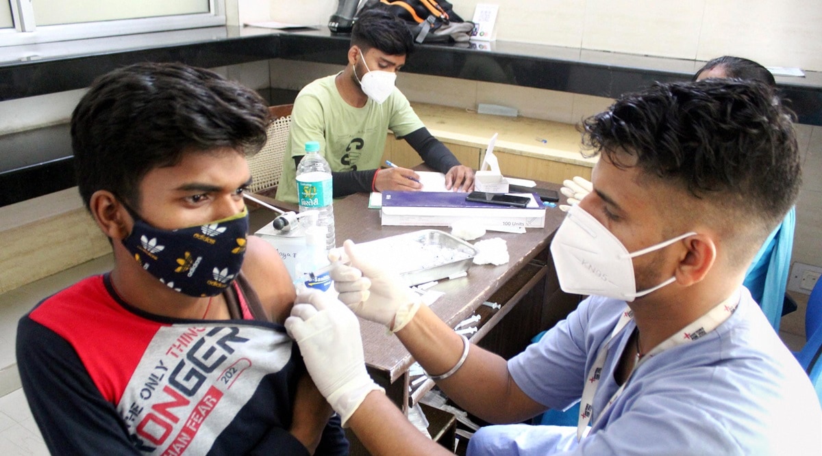 A health worker administers a dose of Sputnik V coronavirus vaccine to a beneficiary at a vaccination centre, in Gurugram, Saturday, July 17, 2021. (PTI Photo) 