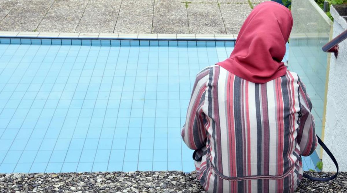 Turkey says allowing the banning of headscarves under certain conditions is a "clear violation of religious freedoms." (Photo Source: DW)