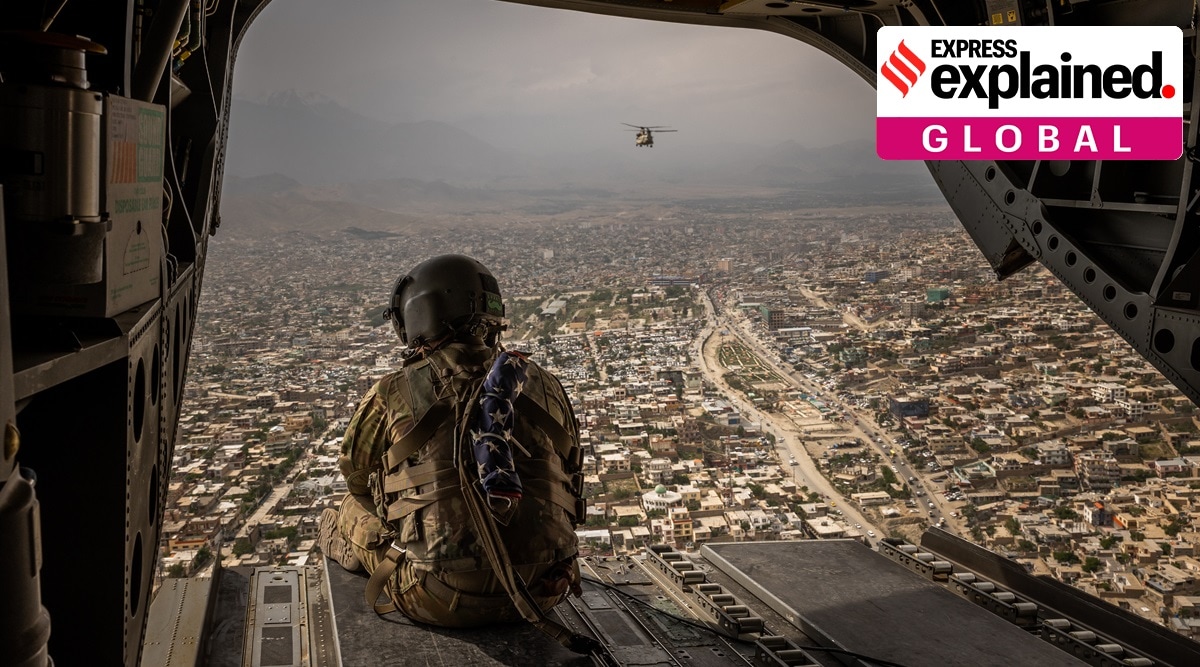 A US Army Chinook helicopter flies over Kabul, Afghanistan, May 2, 2021. (The New York Times: Jim Huylebroek)