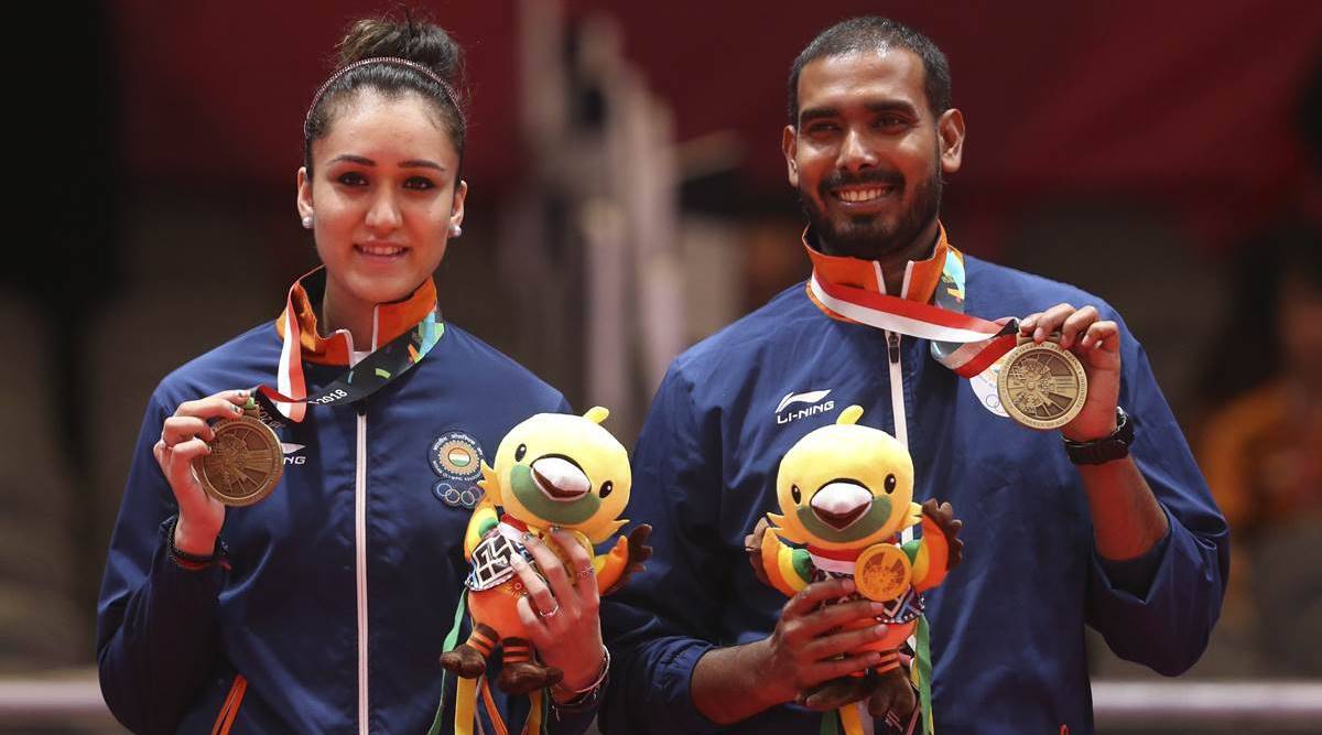 Manika Batra and Sharath Kamal after their 2018 Asiad bronze medal win (Source: AFP)