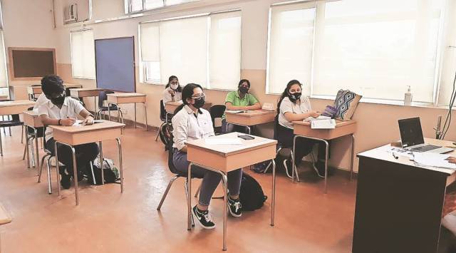 At Shri Ram School in Gurgaon on Thursday. Officials said students of classes VI to IX are being called to school once a week, while those in classes X and XII are coming twice a week. (Express Photo: Gajendra Yadav)