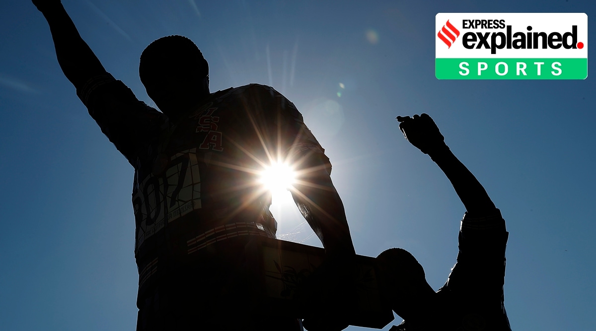 A statue in honour of former Olympians Tommie Smith, left, and John Carlos is seen on the campus of San Jose State University in San Jose, Calif.  Smith and Carlos raised their black-gloved fists while their national anthem played during the 200-meters medals ceremony at the Mexico City Olympics in 1968. (AP Photo/Tony Avelar, File)