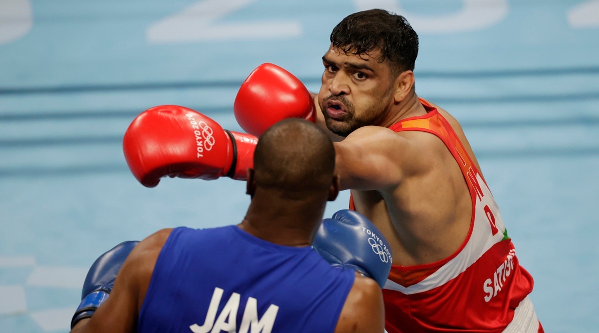 Satish Kumar in action against Ricardo Brown of Jamaica in the men's super heavyweight last-16 bout at the Tokyo Olympics. (Reuters)