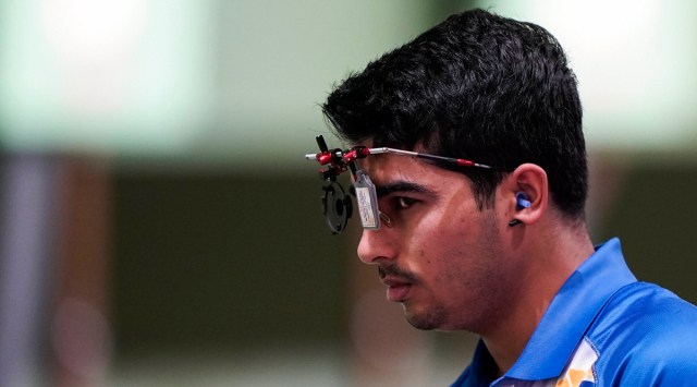 Saurabh Chaudhary of India pauses as he competes in the men's 10-meter air pistol at the Asaka Shooting Range in the 2020 Summer Olympics, Saturday (Source: AP)