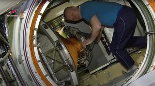 ISS crew member Roscosmos cosmonaut Novitskiy enters Nauka Multipurpose Laboratory Module