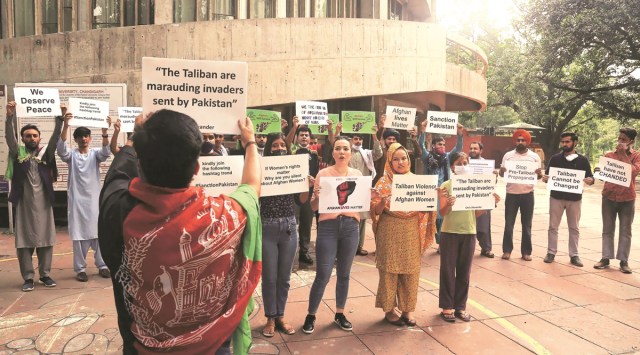 Afghan Students in India protesting to condemn Taliban attack and violence in Afghanistan. (Express Photo by Kamleshwar Singh)