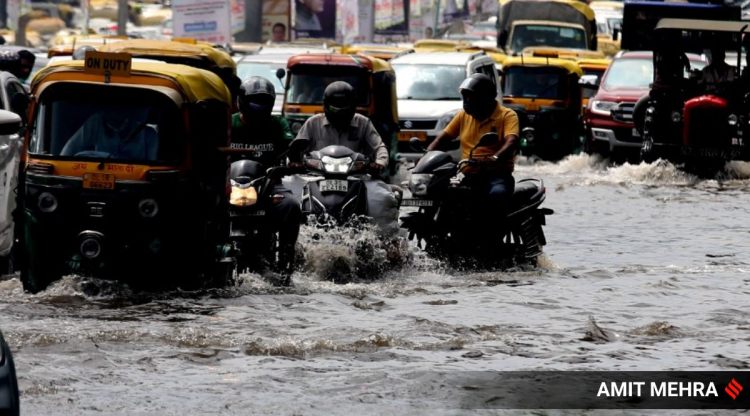 Water Logging during heavy rain at ITO in New Delhi, Saturday.