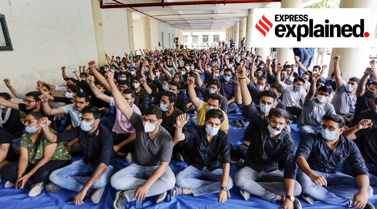 Resident doctors shout slogans during a strike in Ahmedabad, Saturday, Aug. 7, 2021. (PTI Photo)