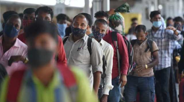 Mumbai: Passengers wait in queues to give swab samples for the Covid-19 testing after arriving  at Lokmanya Tilak Terminus railway Station in Mumbai, Saturday, Aug. 28, 2021. (PTI Photo)