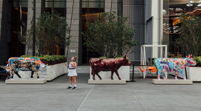 “Creature Cow Alliance,” by Danny Cole, on display at Hudson Yards in New York, Aug. 19, 2021. A public art exhibition with 78 fiberglass cows in the boroughs may be scaled down from 21 years ago, but the herd is delighting passers-by. (George Etheredge/The New York Times)
“Tartan Patchwork Cow,” by Jeffrey Banks, on display at Hudson Yards in New York, Aug. 19, 2021. A public art exhibition with 78 fiberglass cows in the boroughs may be scaled down from 21 years ago, but the herd is delighting passers-by. (George Etheredge/The New York Times)
From left: “Citi of Dreams” by Fernando Romero, “Cora the Cow” by Zac Posen and “Meliora: ‘strange new things can be done’” by Kamila Zmrzla, on display at Hudson Yards in New York. (Source: New York Times)