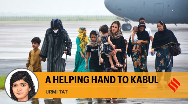 People evacuated from Kabul arrive at Hindon Air force base near New Delhi on Sunday, Aug. 22, 2021. (AP Photo)