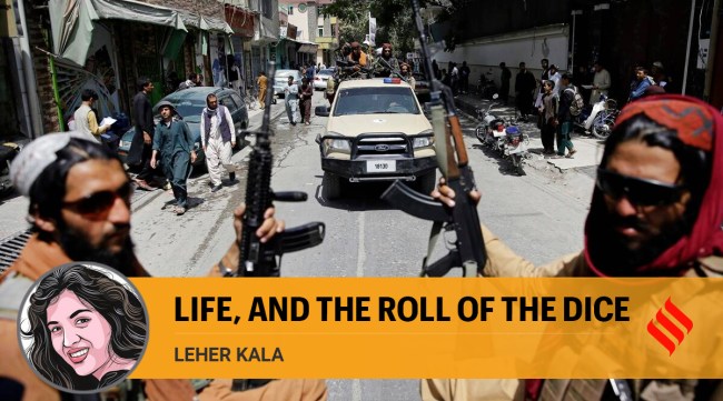 Taliban fighters patrol Kabul (AP Photo)