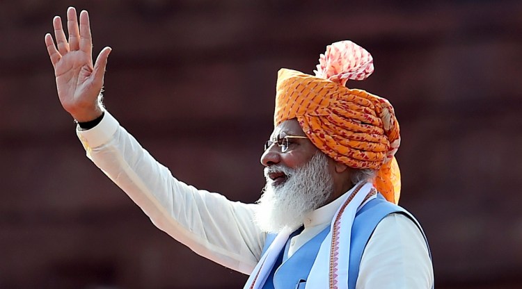 Prime Minister Narendra Modi waves at the audience during the 75th Independence Day function at the historic Red Fort, in New Delhi (PTI)