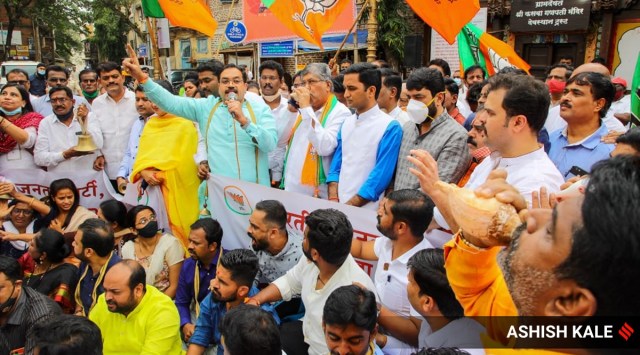 BJP state chief Chandrakant Patil along with local party leaders staged an agitation at Kasbapeth Ganapati Temple in Pune. (Express photo by Ashish Kale)