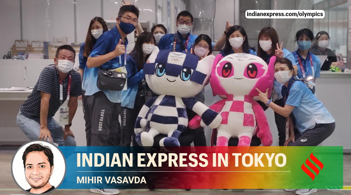 Tokyo 2020: Volunteers with mascots (Mihir Vasavda)