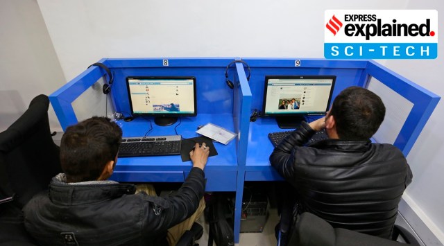 In this Feb. 10, 2016 photo, Afghanis access social media websites at a private internet cafe in Kabul, Afghanistan. (AP Photo: Rahmat Gul, File)