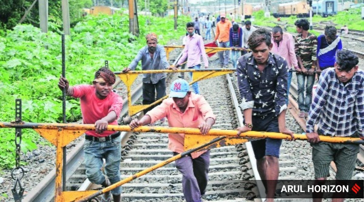 Work on replacement of railway tracks underway at Sangham Bridge on Monday.  (Express Photo by Arul Horizon)